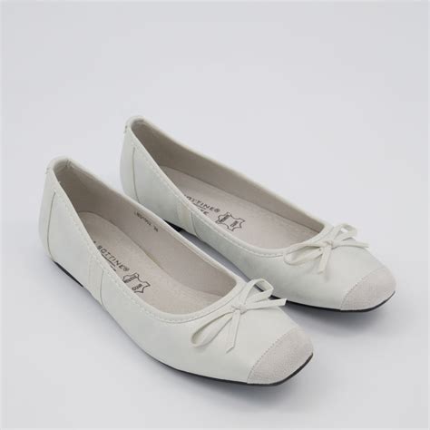 White Satin Ballerinas .